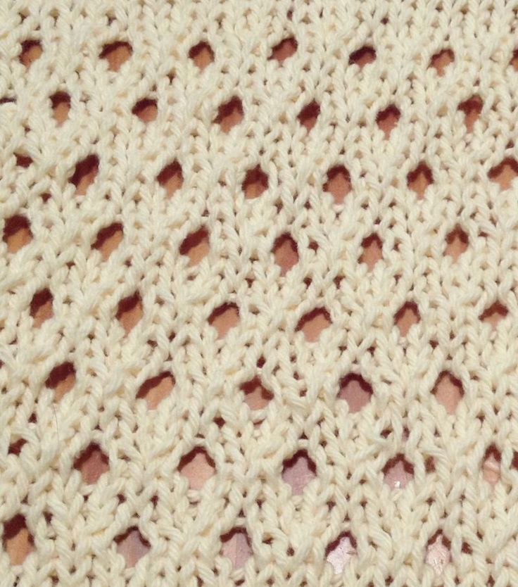 the crochet is white and has small holes in it's center,