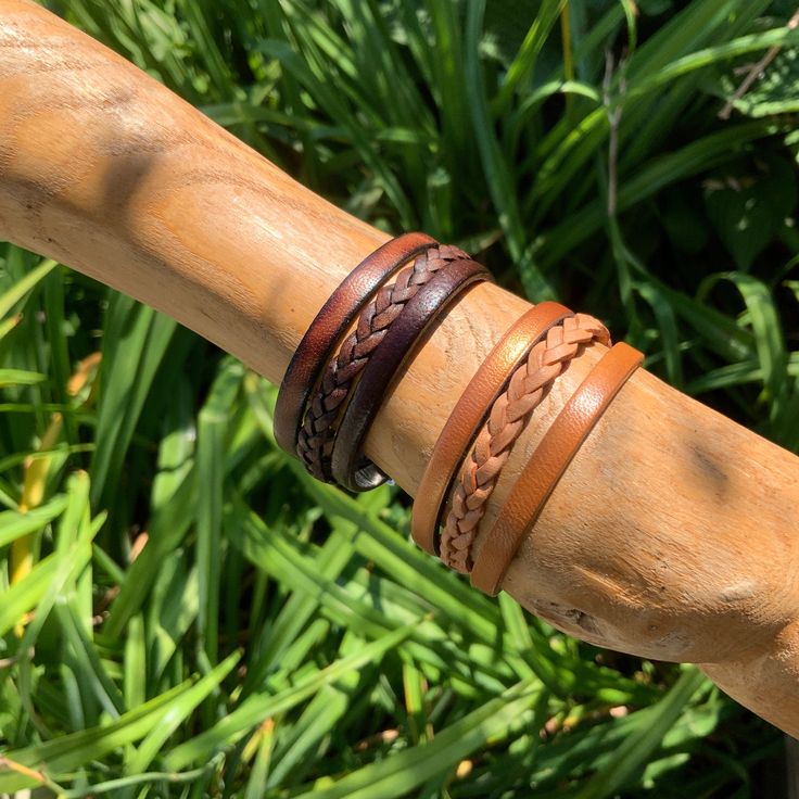 "Fine Quality European Leather makes these Bracelets into a piece (or two!) of very fine Jewelry. Made to wear Everyday or for Special Occasions- just remove it(them!)to swim or shower. A little rain won't hurt them, tho. They will grow more beautiful with time! Wonderful Secure Clasp that you can open and close easily all by yourself!! Great Gift for Men,Women or Kids. Two Color Choices : *Dark Brown with Leopard Pattern *Natural Brown with Metallic Copper Jewelry comes boxed, ready for gifting Traditional Hand Wrapped Brown Bracelet, Brown Braided Bracelet For Gifts, Brown Braided Bangle Bracelets As Gift, Brown Braided Bangle Bracelet For Gift, Adjustable Bohemian Leather Cuff Bracelet, Traditional Brown Bracelets For Festival, Adjustable Brown Bohemian Bangle, Bohemian Brown Wristlet For Gift, Brown Bohemian Leather Bracelet For Everyday Use