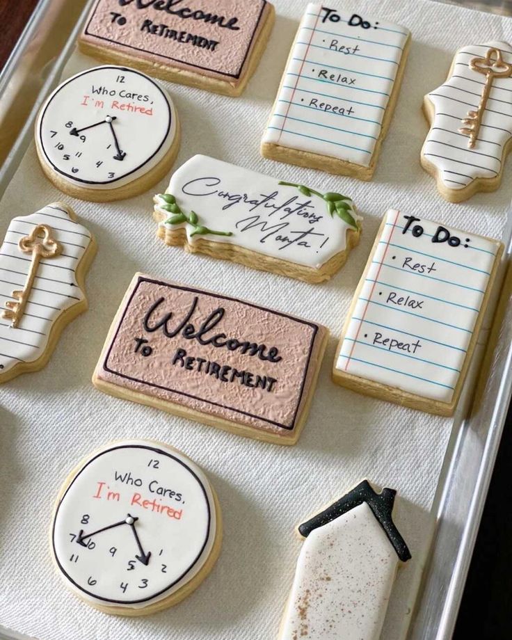 decorated cookies in a tray with writing on them that say welcome to retirement and i'm married