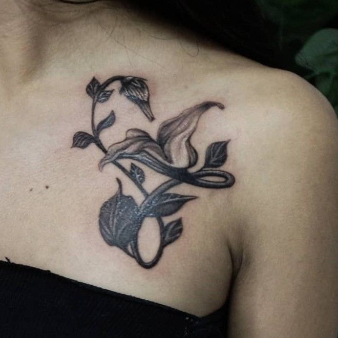 a woman with a tattoo on her chest