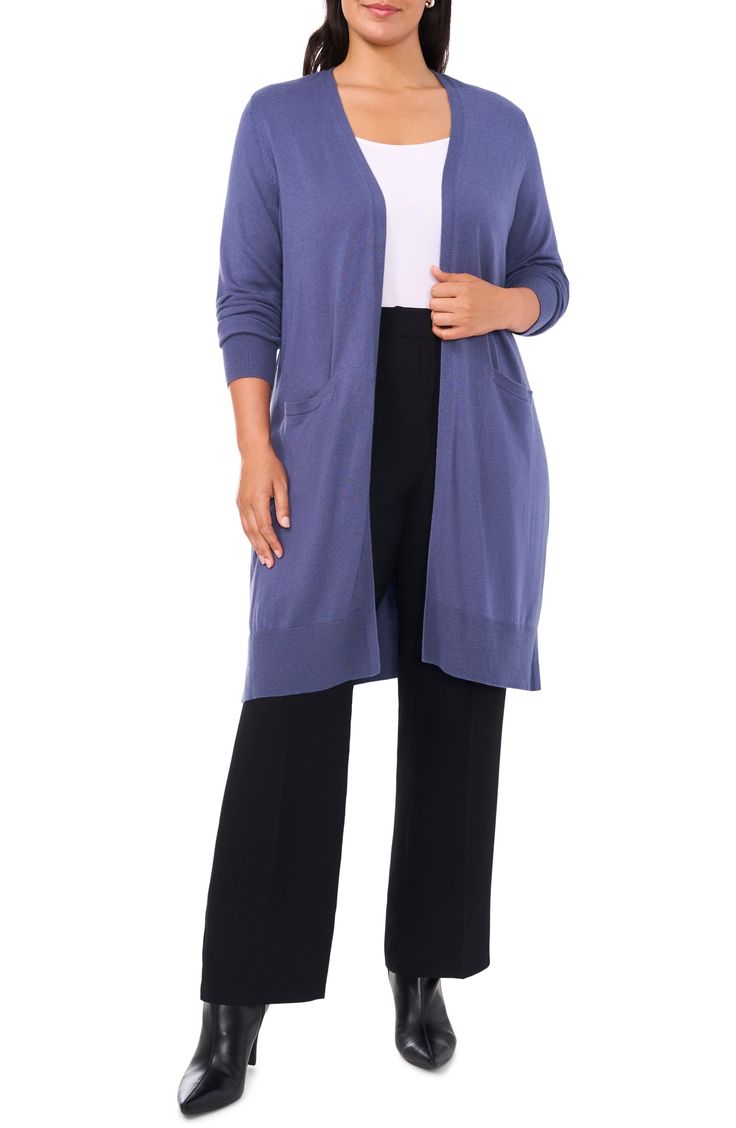 This cotton-softened cardigan is knit in a flowy, longline silhouette with side slits and features handy front pockets. 37" length (size 3X) Open front Long sleeves Ribbed cuffs and hem Front patch pockets Side slits 40% viscose, 40% nylon, 20% cotton Machine wash, dry flat Imported Open Front Cardigan With Pockets For Daywear, Blue Cardigan With Pockets For Layering, Long Cardigan With Pockets For Workwear, Long Cardigan With Pockets For Daywear, Longline Cardigan, Vintage Indigo, Indigo Blue, Long A Line, Front Open