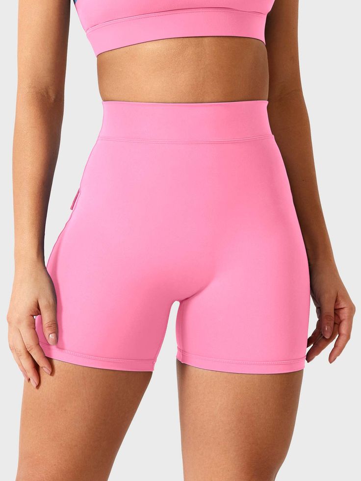 Crafted from nude double-faced fleece, our V-Back Charm Shorts feature moisture-wicking technology and a lift-enhancing design, ensuring comfort and style for your active lifestyle, whether at the gym or out and about.    Feature    Seamless front   Deep V and Scrunch butt   Pocket design   Squat-proof   Super soft fabric   4.5-inch inseam     Fabric    75% Nylon + 25% Spandex     Model Measurements    Model Wear: S   Height: 173cm / 5'7"   Bust: 87cm / 34.3″   Waist: 62cm / 24.4″   Hips: 97cm / Breathable Solid Color Functional Bottoms, Breathable Functional Solid Bottoms, Moisture-wicking Solid Color Sports Bottoms, Solid Moisture-wicking Sports Bottoms, Breathable Solid Micro-elastic Bottoms, Compressive Sportswear Bottoms With Breathable Fabric, Compressive Breathable Bottoms For Sportswear, Functional Workout Bottoms In Solid Color, Nylon Gym Bottoms In Solid Color