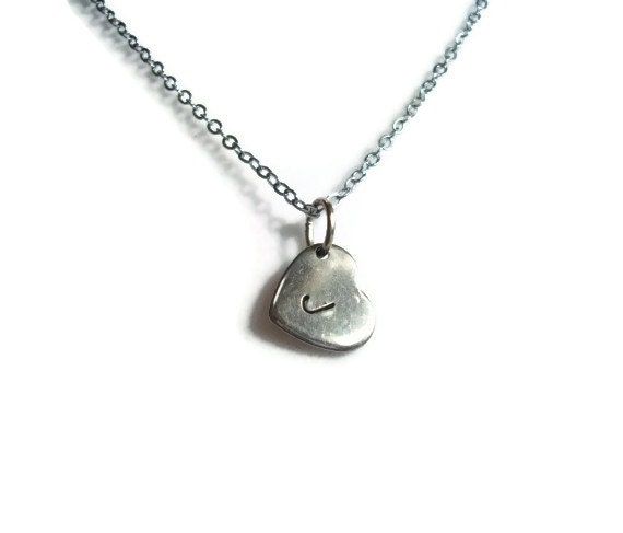 "Personalized Heart Pendant Necklace, Gift for Her, Bridesmaid Jewelry This personalized necklace features a hand stamped letter on a heart pendant.  Stainless steel heart charm measures 11x10x0.6mm and is set on a 17\" 2mm silver tone brass chain complete with a lobster clasp.  Great to wear alone or layer with your other favorites from The Phlox Shop! Please let me know what letter upon purchase! For special sizing, please just let me know! All measurements are approximate." Silver Hand Stamped Heart Necklace For Anniversary, Everyday Heart Engraved Jewelry, Silver Stamped Charm Necklace For Valentine's Day, Silver Stamped Charm Necklaces For Valentine's Day, Hand Stamped Heart Sterling Silver Charm Necklace, Silver Heart Necklace With Hand Stamped Details, Sterling Silver Hand Stamped Heart Charm Necklace, Hand Stamped Sterling Silver Heart Pendant Necklace, Sterling Silver Hand Stamped Heart Pendant Necklace