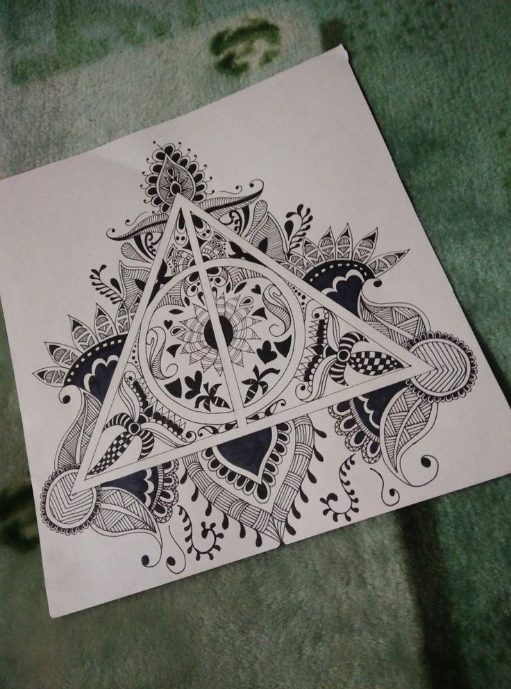 a pen and ink drawing of a triangle