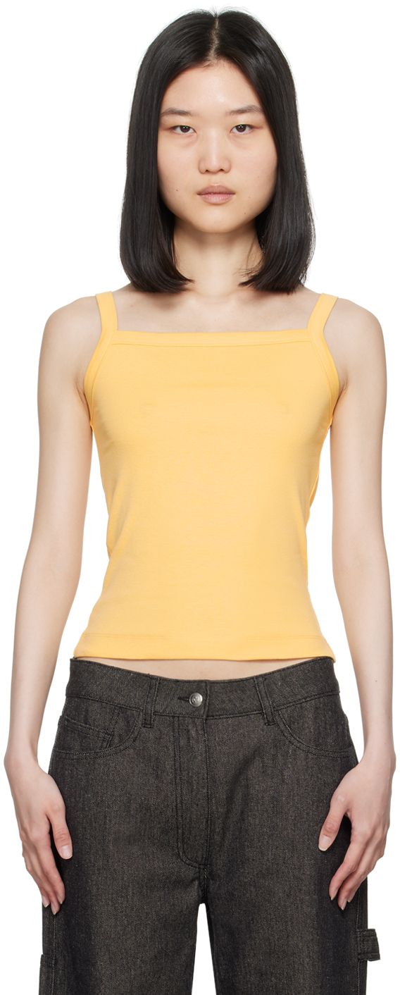 Organic cotton jersey camisole. Rib knit square neck and shoulder straps. Supplier color: Buttercup Square Neck Top With Adjustable Straps For Spring, Spring Square Neck Tank Top With Adjustable Straps, Summer Cotton Tank Top With Square Neck, Square Neck Cotton Tank Top For Summer, Summer Square Neck Top With Adjustable Straps, Cotton Seamless Square Neck Top, Seamless Square Neck Cotton Tops, Casual Cotton Camisole With Square Neck, Fitted Camisole Top With Adjustable Straps