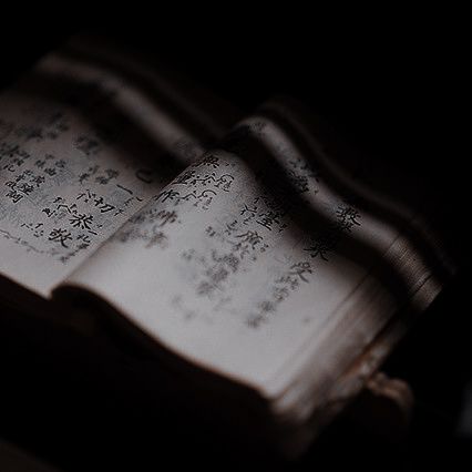 an open book sitting on top of a table