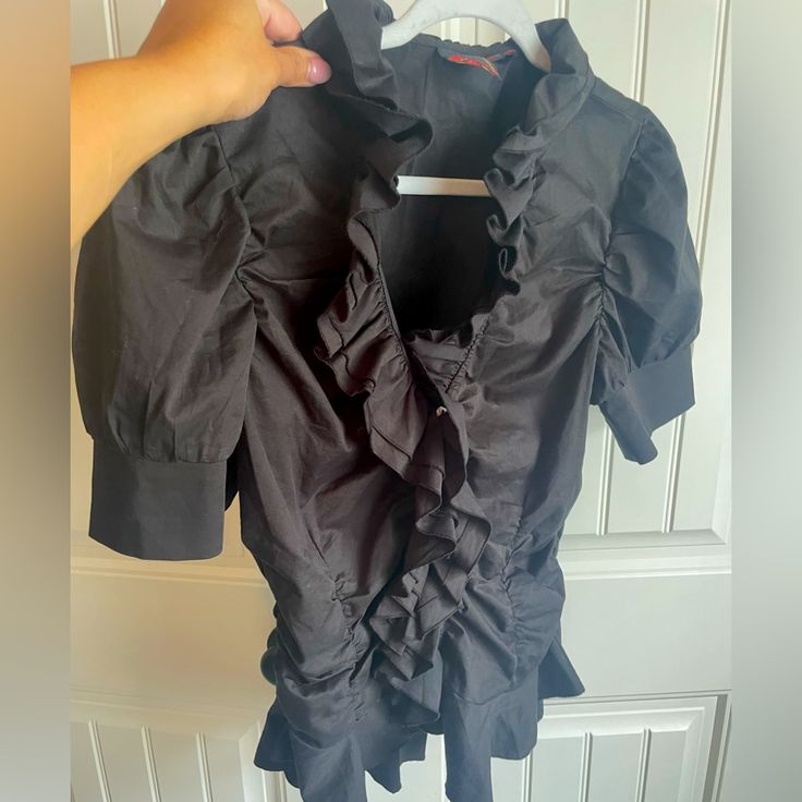 Debbie Shuchat Black Ruffle Shirt Size 14 Black Ruffle On The Front And All The Way Around It Does Run A Little Small But It’s Size 14 Excellent Condition Never Worn But No Tags From Smoke Free / Pet Free Home. Feel Free To Ask Questions Or Make Offers. Bundle Shipping Available A42 Ruffle Shirt, Black Ruffle, All The Way, The Way, Button Down Shirt, Womens Tops, Feel Free, Pet, Tags