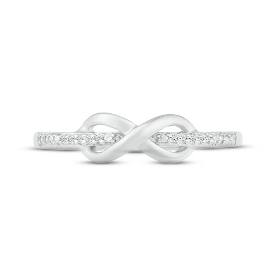 A sweet infinity design wraps around the center of this dainty ring. Glittering diamond accents adorn the band, which is crafted in classic sterling silver. Diamond Infinity Ring, Infinity Diamond Ring, Infinity Design, Infinity Ring, Dainty Ring, The Band, Ring Sterling Silver, Sterling Ring, Sterling Silver Rings