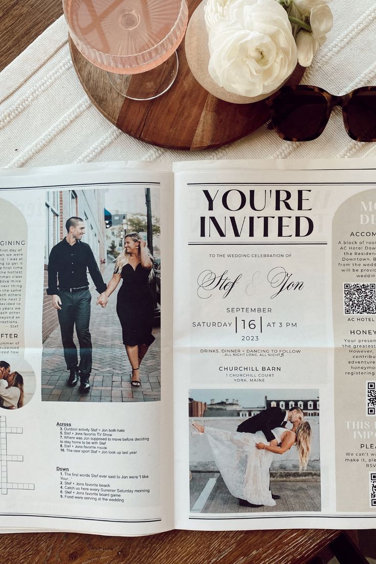 an open magazine on a table with flowers and sunglasses next to it, along with a couple holding hands