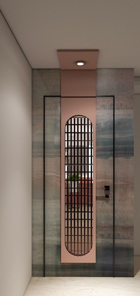 an empty room with a door that has bars on the front and side doors to it