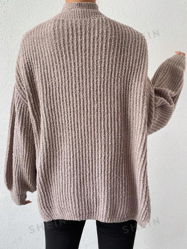 Oversized Turtleneck Knit Cardigan, Oversized Knit Turtleneck Cardigan, Ribbed Long Sleeve Winter Cardigan, Ribbed Long Sleeve Cardigan For Winter, Oversized Ribbed Knit Top For Fall, Oversized Winter Knit Top For Layering, One Size V-neck Sweater For Fall, Cozy Long Sleeve Ribbed Outerwear, Beige Ribbed Crew Neck Outerwear