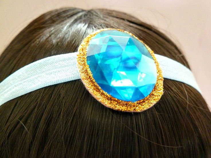 "PRINCESS JASMINE HEADBAND,Aladdin, Halloween Jasmine Costume Cosplay. Big aqua stone attach to blue satin soft headband - very Comfortable:) please choose the size before check out - in order you will choose the right size its best that you will measure your head and then Reduce 1\" from the size of your head - and this is the size that you need:) you can also choose the frame of the stone - Gold Matt Metal Frame or Glitter Frame - please see the last picture:) --------------------------------- Jasmine Headband, Aladdin Halloween, Princess Tiana Costume, Princess Jasmine Costume, Girl Group Costumes, Couple Halloween Costumes For Adults, Pirate Halloween Costumes, Greek Goddess Costume, Aqua Stone