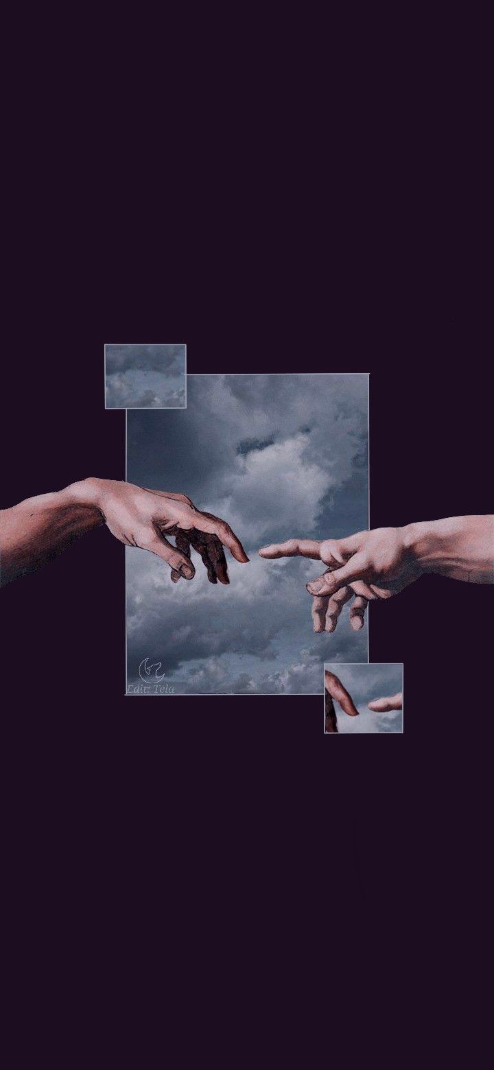 hands reaching out to touch each other in front of a dark sky with white clouds