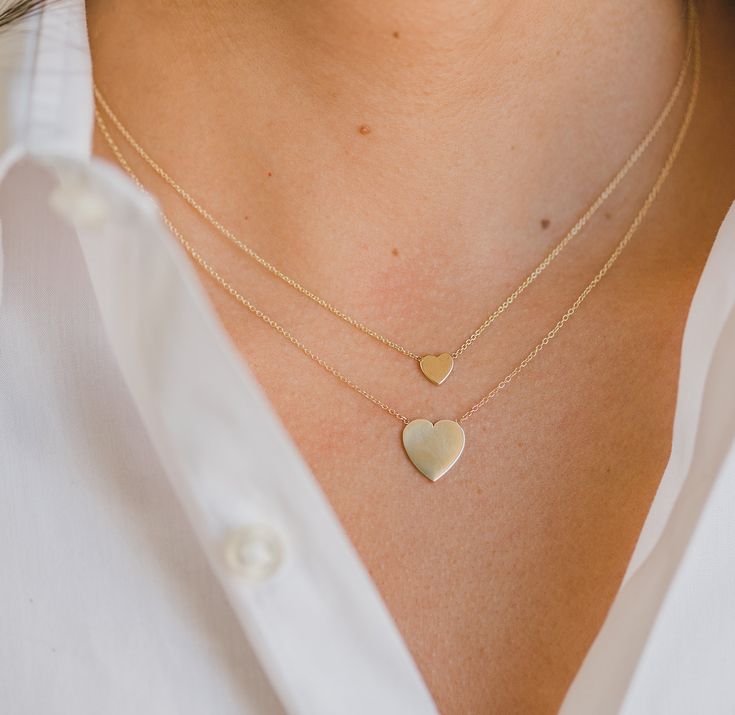 Classic and uber chic 14k gold heart on a dainty cable link chain necklace. Effortlessly chic, a timeless necklace that also makes the perfect gift! Made in L.A. *Size of Heart: Approx. 6mm(W) by 6mm(H) *Total Weight: Approx. 1 gram *Ships in 5-7 business days Comes gift ready in a custom Zoe Lev jewelry box Small Heart Necklace, Diamond Ear Cuff, Bar Stud Earrings, Large Heart, Gold Bead Bracelets, Gold Heart Necklace, Link Chain Necklace, Small Heart, Heart On