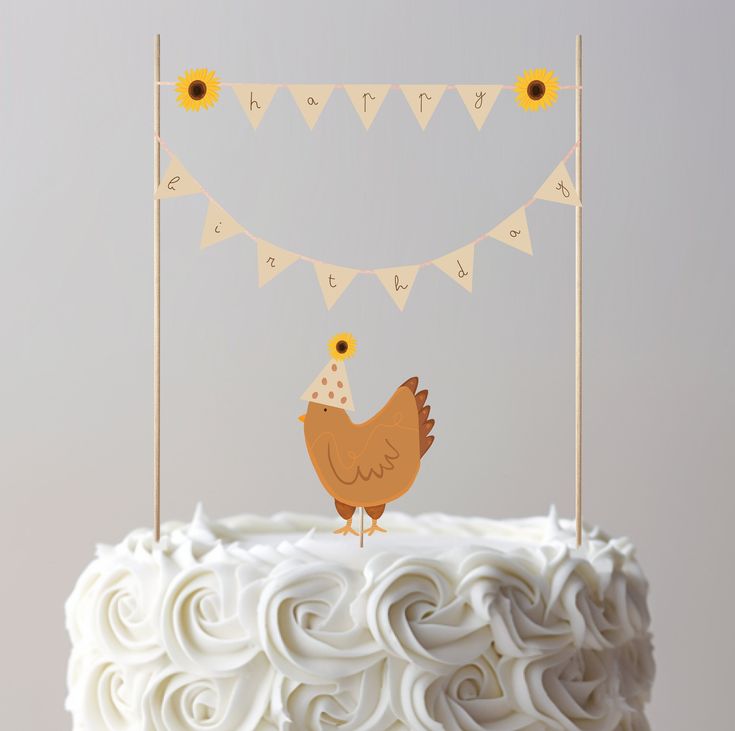 a birthday cake with a chicken decoration on top