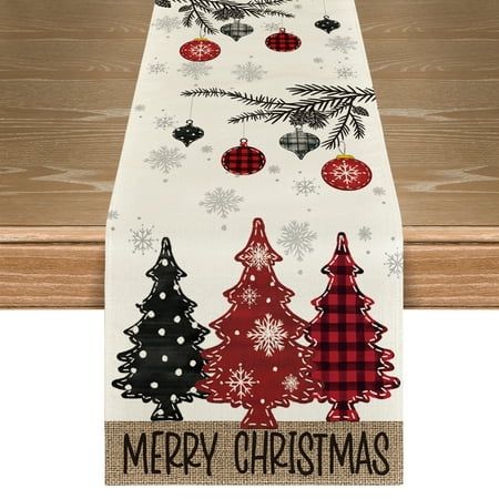 a table runner with christmas trees on it