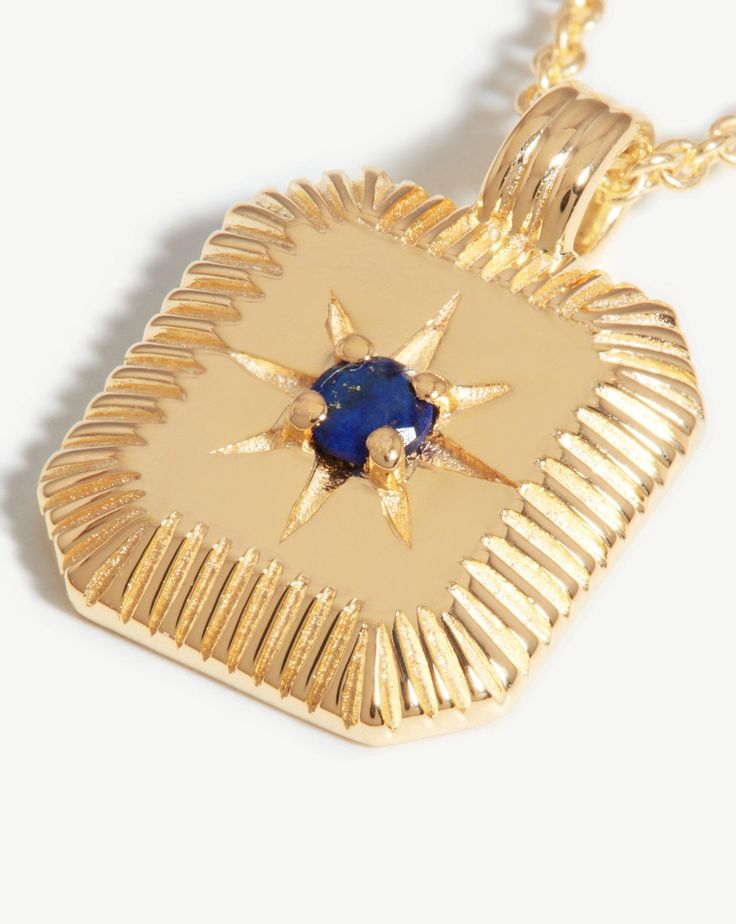 Star Ridge Birthstone Pendant Necklace | 18k Gold Vermeil/Lapis Lapis/September. Bring Your Birth Month a Whole New Meaning with a Personalized Gemstone Necklace. The Ridged Pendant, Held on a Short Chain Necklace, Holds a Natural Lapis Stone, Symbolizing Strength and Courage, and is Embellished with a Central Star Motif. The Perfect Gift for Anyone Born in September. Please Note: Engraving Items May Take 2 Working Days to Process. Metal: 18K Recycled Gold Plated Vermeil on Recycled Sterling Sil Gold Plated Gemstone Amulet Jewelry, Gold Gemstone Pendant Jewelry, Gold Pendant Jewelry With Gemstone, Luxury Gold Plated Jewelry With Rectangular Pendant, Luxury Gold Plated Rectangular Pendant Jewelry, Celestial Gold Gemstone Jewelry, Yellow Gold Plated Square Pendant Jewelry, Gold-plated Yellow Gold Square Pendant Jewelry, Yellow Gold Pendant Jewelry With Jewels