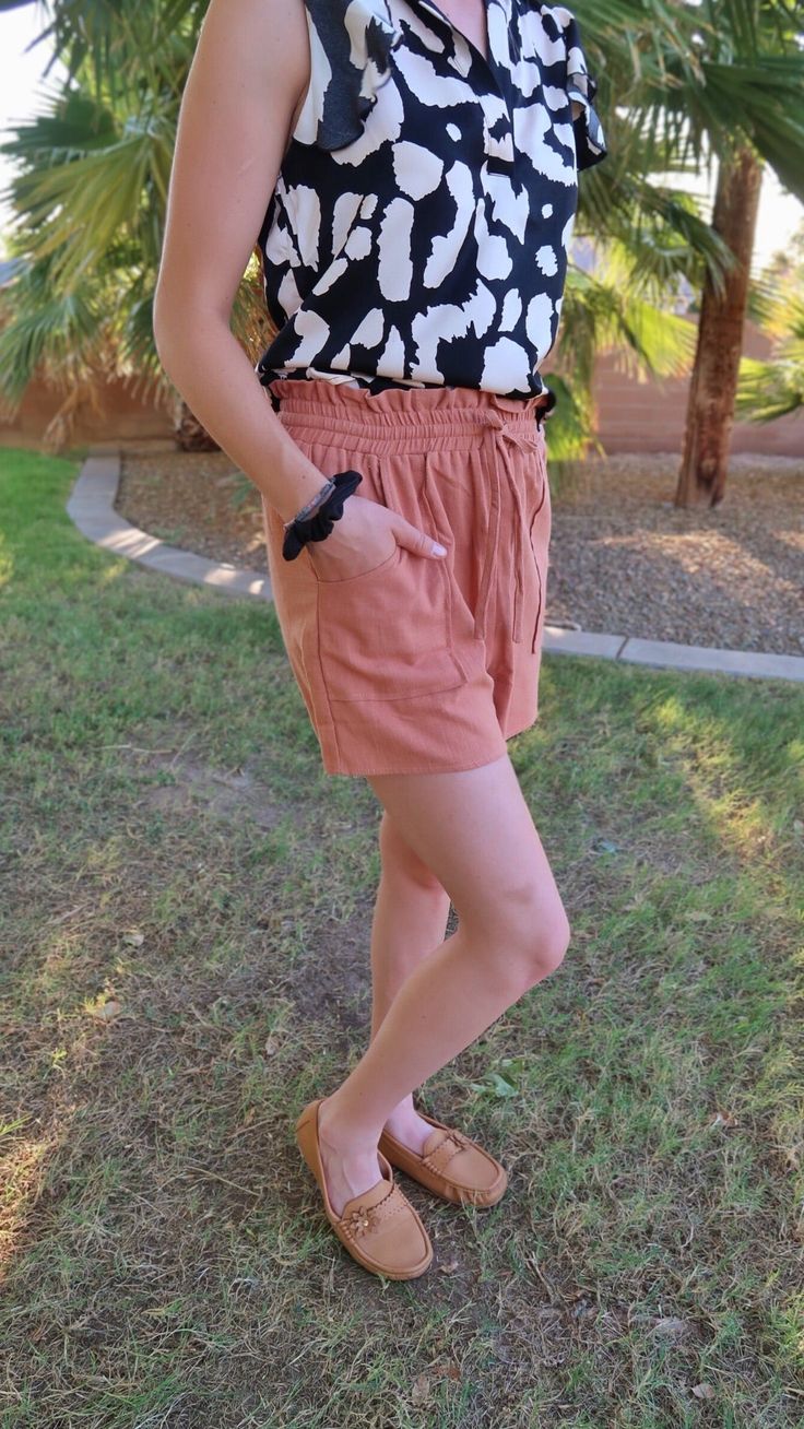 Get ready for some fun in the sun with our Guava Paperbag Shorts! These playful shorts feature stylish patch pockets that are perfect for carrying all your beach essentials. With a relaxed fit and boho design, these shorts will make a statement wherever you go. Don't miss out on this vacay must-have! Elastic waist Patch pockets 3" inseam Fits true to size Model info: Ayden is 5'7" and is wearing a Small Fabric content: Care instructions: machine wash cold, line dry High-waisted Jean Shorts With Built-in Shorts For Beach, Casual Summer Shorts With Side Pockets, Casual Bermuda Shorts For Beach, Summer Cotton Cargo Shorts, Summer Vacation Shorts With Pockets, Vacation Cotton Cargo Shorts With Built-in Shorts, Cotton Cargo Shorts With Built-in Shorts For Vacation, Casual Cotton Shorts For Vacation, Casual Bermuda Shorts With Elastic Waistband For Vacation