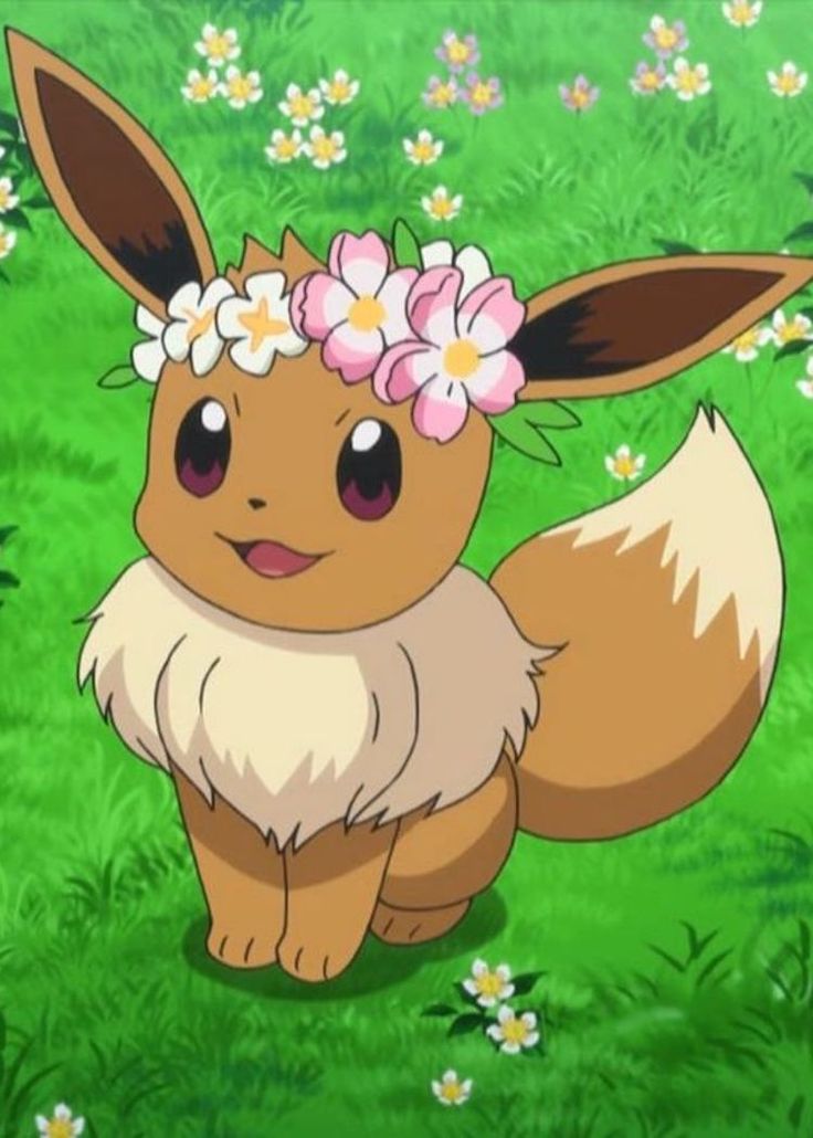 a cute little animal with flowers in its hair