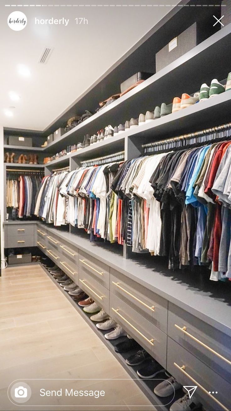 a walk in closet filled with lots of clothes