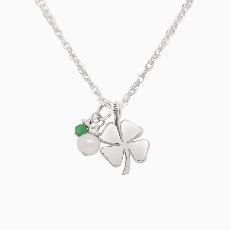 She is one lucky little lady! A petite (fits on a dime) shiny sterling silver four-leaf clover charm mingles with a gorgeous freshwater pearl and her very own special birthday gem. A wonderful and lovely reminder that she always carries her very own luck with her, on all of her adventures. Her lucky charm necklace includes: sterling clover charm (from tippy-top to bottom, a bit smaller than a dime) cultured freshwater pearl charm genuine birthday gem dangle charm [split] Details about your neckl Silver Charm Necklace For May Birthstone Birthday Gift, Silver Charm Necklace For May Birthday, Delicate Silver Necklace With May Birthstone, Delicate Silver Necklace For May Birthstone, Sterling Silver Charm Necklace With Pearl Pendant For Anniversary, Sterling Silver Flower Charm Jewelry For Birthday Gift, Classic Sterling Silver Charm Necklaces With Birthstone, Sterling Silver Jewelry With Flower Charm For Birthday, Delicate Silver Charm Necklaces For Birthday