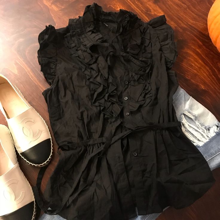 Nwot Black Top With Ruffles On Sleeves And Neckline. Also Has String Tie On Neckline And At Waist (Cinch Waist). Button Opening. Size L But Fits Medium Best! Black Ruffle Top, Top With Ruffles, Ruffled Top, Black Ruffle, Ruffle Top, Cinched Waist, Black Top, Ruffles, Top Blouse