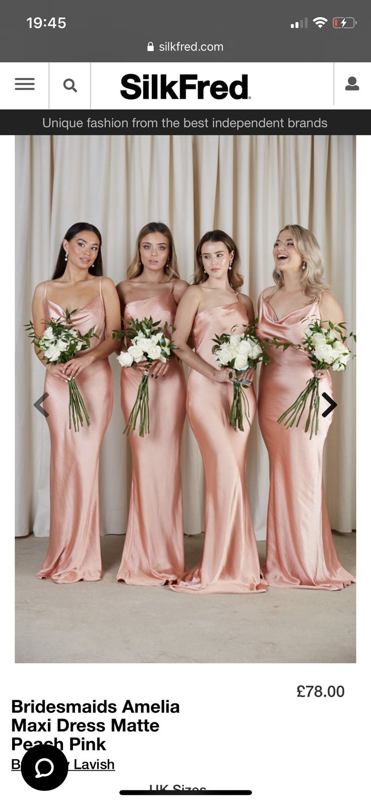 the bridesmaids are posing in pink dresses for their photo shoot at the wedding