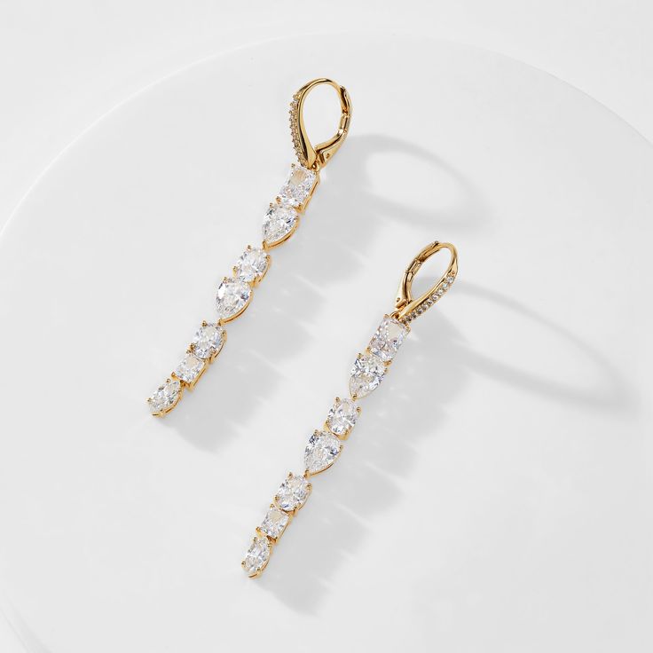 ABOUT THE PRODUCTShine bright with these elegant long linear earrings featuring mixed CZ stones for ultimate sparkle. Metal: Brass Plating: 18KT Gold or Rhodium Stones: Cubic Zirconia Length: 2 1/8 in Width: 1/4 in Cubic Zirconia Drop Linear Earrings For Evening, Long Drop Linear Earrings With Diamond Accents, Long Drop Cubic Zirconia Linear Earrings, Long Drop Linear Earrings With Cubic Zirconia, Elegant Dangle Linear Crystal Earrings, Luxury Long Drop Cubic Zirconia Linear Earrings, Cubic Zirconia Long Drop Linear Earrings, Modern Cubic Zirconia Linear Earrings For Wedding, Linear Drop Earrings With Sparkling Cubic Zirconia Stones