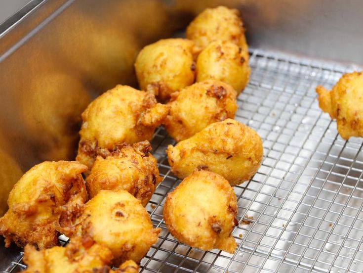 some fried food is on a metal rack