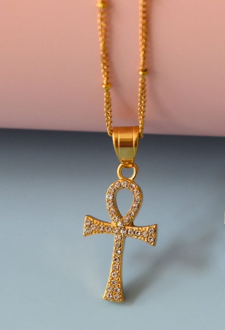 Gold Filled Ankh Cross Necklace, Mens, Women, Kids Chain Necklace, Minimalist Cross Necklace, Cross Charm Necklace WATERPROOF Gold Cross Necklace Gold Dainty Religious Cross Unisex Necklace Stainless Steel Chain Pray Rosary Pendant ✨ 🔹HOW TO ORDER 🔹 1️⃣Please pick the chain type from the first drop down list.  2️⃣Please pick the chain length from the second drop down list.  3️⃣ Enter the cross style you want at personalization box. 🟨Chains and charms are all made of 18K gold filled over Stainless Steel. It will not change color and can be worn in water. Our jewelry is made to last, anti-tarnish, higher durability than a regular gold-plated material, perfect for everyday wear. 🟨We are very proud of what we sell and you will not be disappointed. Please check our customer reviews. OTHER D Pray Rosary, Cross Necklace Mens, Cross Necklace Gold, Dope Jewelry Accessories, Cross Charm Necklace, Cross Necklace Women, Ankh Necklace, Ankh Cross, Necklace Mens