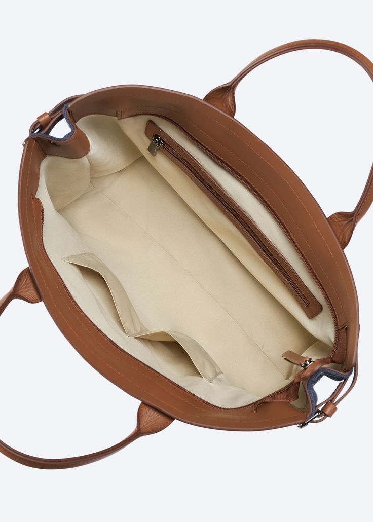 Practical, stylish and flexible, this two-strap bag can be used as a crossbody bag or a stylish canvas tote. Inspired by the Cote D’Azur, this elegantly simple bag is perfect for strolling down Cannes’ unofficial style catwalk, La Croisette. Available in beige, olive and navy. Measurements 14.3" (length) x 11.3" (height) x 4.3" (width) Hand Made With Love Handcrafted and made in Spain 100% organic canvas Premium leather Easy Care Use damp cloth with cold water and let air dry Simple Bag, Strap Bag, Canvas Handbags, Simple Bags, Handbag Straps, Trending Today, Women Men Shoes, Bag Straps, Cannes