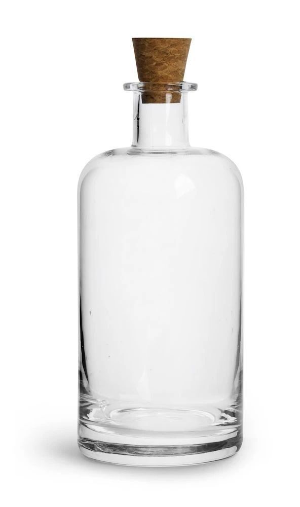 a clear glass bottle with a wooden top on a white background, the bottom is empty