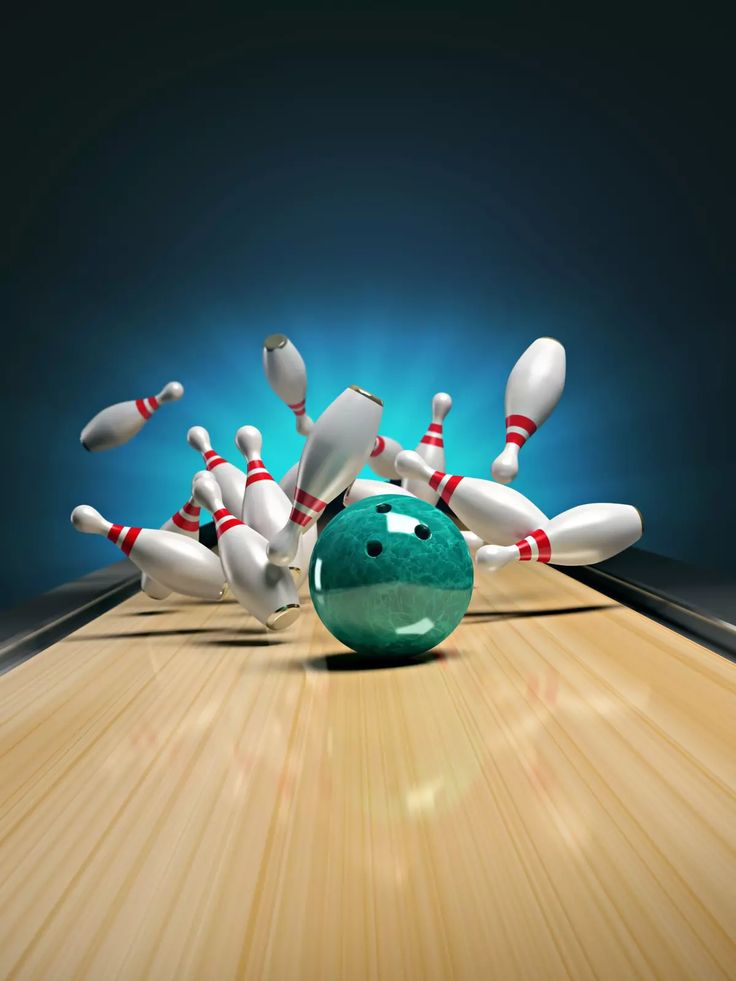 a green bowling ball crashing into the pins