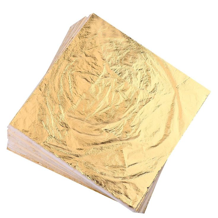 a stack of gold foil sitting on top of each other