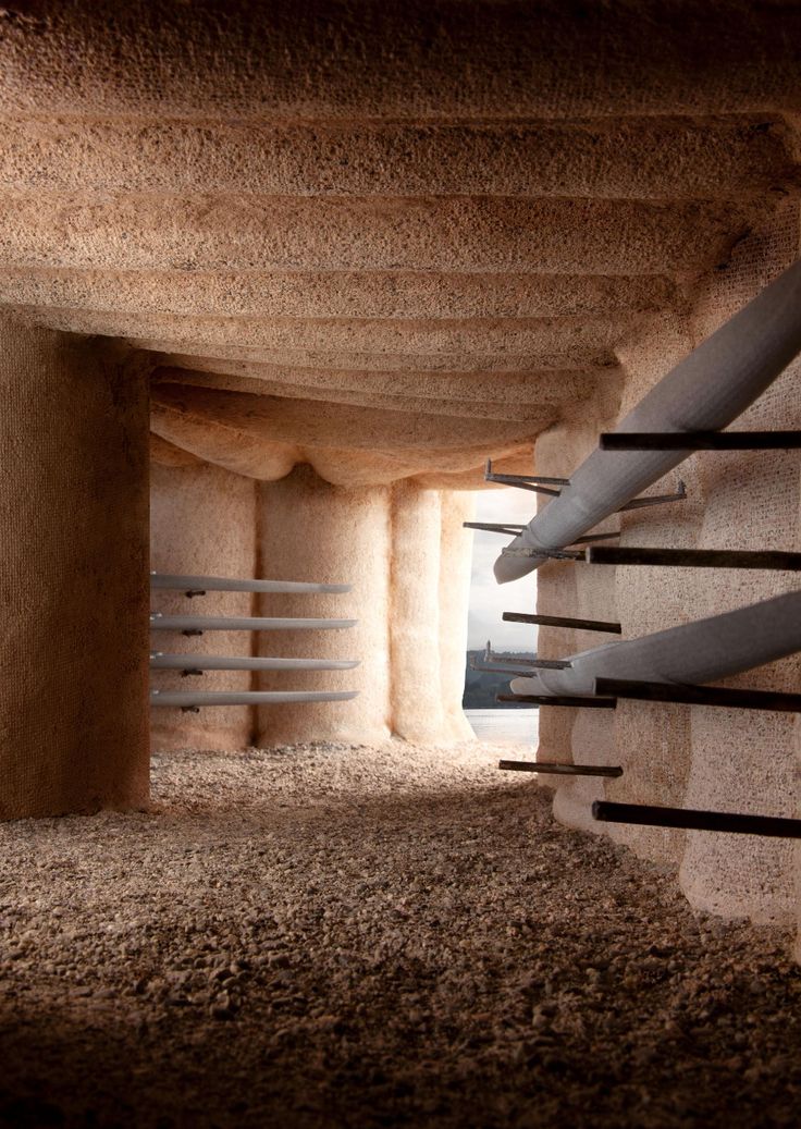 the inside of a cave with some stairs leading up to it