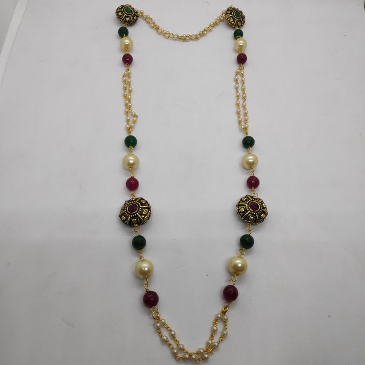 its a beautiful multicolor beadstring necklace. it has multi color beads along with antique beads and white pearl strings. you can wear it on all occasions. Elegant Colorful Metal Beads, Elegant Beaded Necklaces With Colorful Metal Beads, Traditional Pearl Necklaces With Colorful Beads, Traditional Pearl Beaded Necklaces With Colorful Beads, Colorful Elegant Beaded Necklaces, Festive Long Beaded Necklace With Colorful Beads, Festive Multicolor Beaded Chain Necklace, Multicolor Metal Bead Necklaces, Festive Beaded Pearl Necklaces