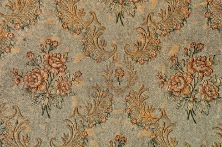 an old fashioned wallpaper with flowers and leaves on the side, is shown in this image