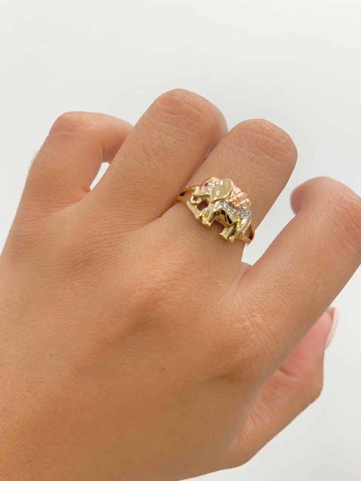 -14k Elephant Ring  -100% Gold  -Size 7  -Tricolored Gold  -Cubic zirconia  -Item sold by piece. Weight undetermined. Tarnish Resistant Diamond Rings Fine Jewelry, Fine Jewelry Tarnish Resistant Round Cut Rings, Fine Jewelry Tarnish Resistant Rings With Round Cut, Gold Tarnish Resistant Round Cut Diamond Ring, Gold Diamond Ring With Round Cut, White Gold Diamond Rings Tarnish Resistant, 14k Gold Crystal Ring For Anniversary, Tarnish Resistant, Yellow Gold Cubic Zirconia Cluster Ring, 14k Gold Tarnish Resistant Crystal Ring