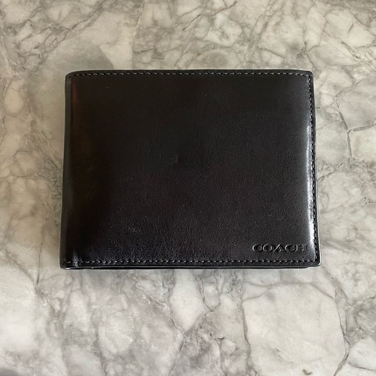 Black Coach Mens Wallet. Never Used But Does Have A Few Marks, Overall Excellent Condition. Comes With The Removable Card Case As Well. Price Is Firm. Coach Trifold Wallet With Rfid Blocking, Coach Rfid Blocking Trifold Wallet, Coach Black Trifold Wallet With Card Slots, Coach Trifold Wallet With Rfid Blocking For Formal Use, Classic Black Trifold Wallet With Coin Pocket, Classic Black Trifold Wallet For Business, Coach Rectangular Trifold Wallet With Coin Pocket, Coach Trifold Wallet With Coin Pocket For Formal Use, Classic Black Wallet With Coin Pocket