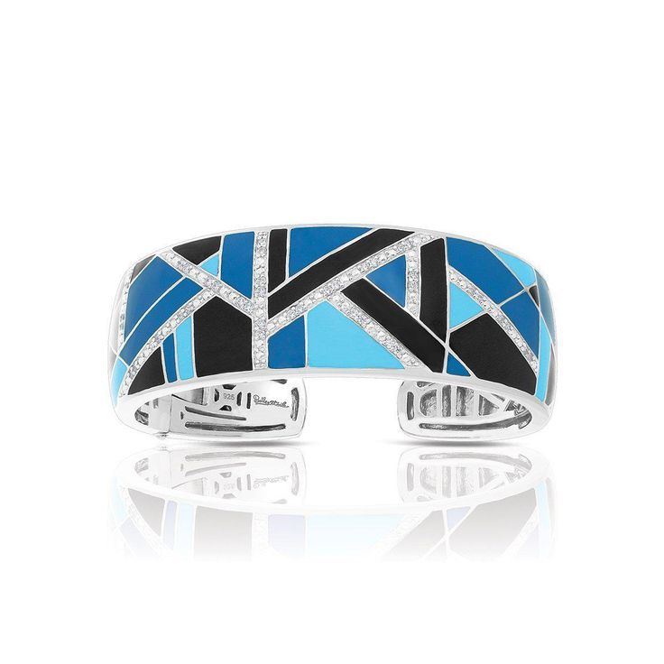 The Delano Collection by Belle Étoile captures the essence of the Art Deco period. Stylish patterns of hand-painted blue and black Italian enamel create a new spin on a classic motif. Enter a new era with the Delano Collection. Description: Hand-painted blue and black Italian enamel with pavé-set stones set into rhodium-plated, nickel allergy-free, 925 sterling silver. 2019 JCK Jewelers' Choice Awards - 1st Place, Silver Jewelry, $500 - $1,000 category - Delano Blue & Black BangleVB-17015-01 Colored Diamond Jewelry, Black Bangle, Open Cuff Bracelet, Fine Silver Jewelry, Mens Silver Necklace, Classy Jewelry, Art Deco Period, Sterling Silver Bangles, Choice Awards