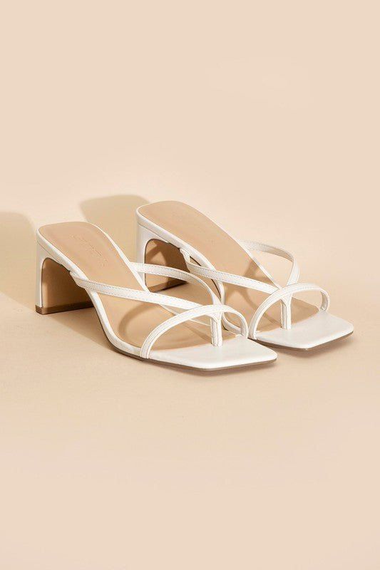 Effortlessly slip on the Bridget Slip On Heel Mule for a vintage-inspired look. The low heel and padded footbed provide all-day comfort, while the scrappy design adds a touch of elegance. Step into style and comfort with these classic mules. Mules fit true to size Strappy Mules, Mule Heels, Low Block Heels, Comfortable Heels, China Fashion, Toe Designs, Thong Sandals, High Heel Sandals, Low Heels