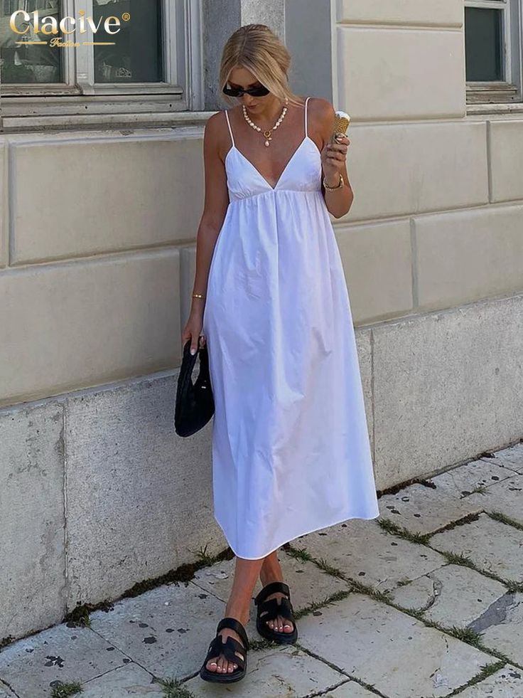 49428745453878|49428745486646|49428745519414 Midi Dress Elegant, Sleeveless Midi Dress, Effortless Elegance, White Midi Dress, Midi Dress Sleeveless, Waist Length, Elegant Dresses, A Line, Midi Dress