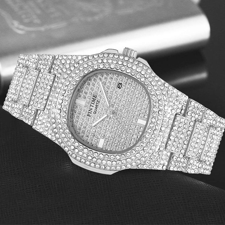 Drop the best, shine your best! This watch is an absolutely stunning timepiece, it looks like it belongs on the wrist of the richest hip hop stars and businessmen alike. You're guaranteed to stand out while rockin' this unique piece. DETAILS Material: 316 Stainless Steel + High-rated cut and quality CZ simulated diamonds Stone Type: High-rated cut and quality CZ simulated diamonds Water Resistance Depth: 30M Dial Thickness: 10MM Dial Diameter: 40MM Clasp Type: Butterfly double snap Grab your ice Iced Watches, Classic Fashion Pieces, Iced Out Watch, Hip Hop Watches, Gold Clock, Gold Plated Watch, Diamond Watches For Men, Anime Boy Sketch, Diamond Ice