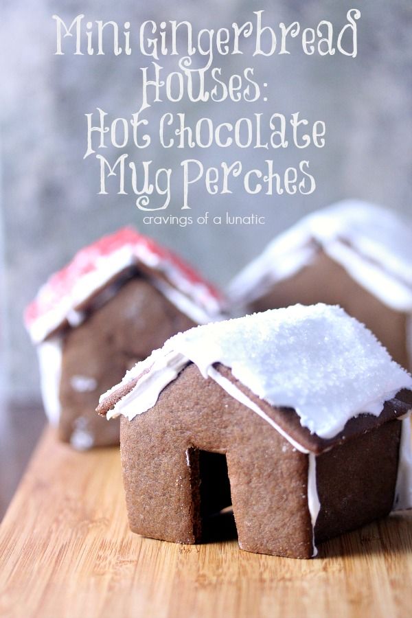 two gingerbread houses with white frosting on top and the words, mini gingerbread houses hot chocolate my perfects