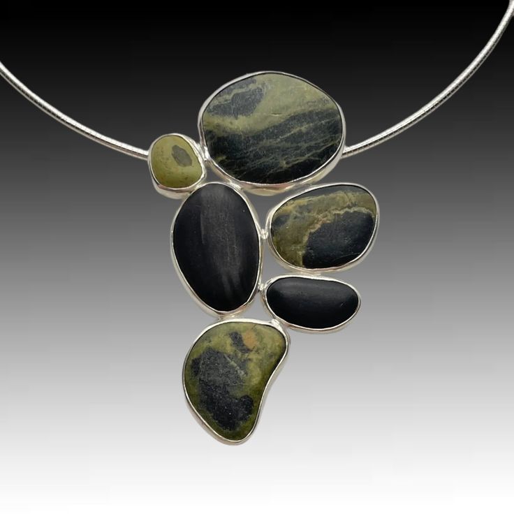 Beachstone Pendant Modern Green Multi-stone Jewelry, Large Stone Round Necklace, Modern Large Stone Jewelry For Formal Occasions, Sterling Silver Necklaces With Stones, Round Necklaces With Large Stone, Modern Natural Stone Pendant Jewelry, Modern Green Pendant Jewelry, Luxury Large Stone Pendant Jewelry, Modern Round Natural Stone Necklaces