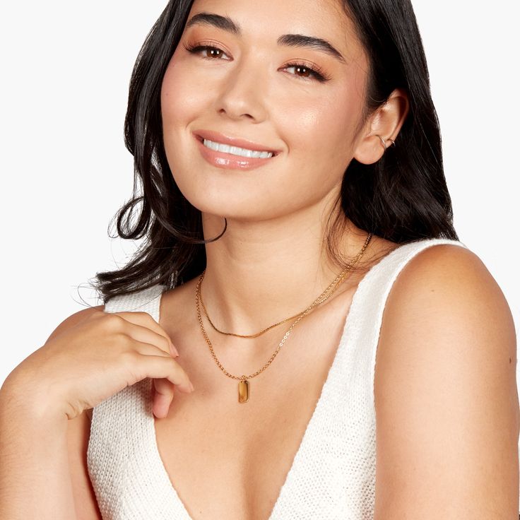 Discover bold, effortless elegance with our Sloan Layering Set. Crafted with the finest materials, this layering set includes an initial pendant and a flat snake chain. Perfect for any occasion, the Sloan Layering Set is a timeless statement of sophisticated style. Are you ready to embrace effortless elegance? Available in 14k gold plated brass Sloan Pendant: Size: 5/8" by 1/4"; Length: 16" flat curb chain with 2" extender Lily Necklace: Length: 16" flat snake chain with 2" extender With engravi Double Chain Snake Necklace For Layering, Snake Chain Necklace With Double Chain For Layering, Delicate Chain Herringbone Necklace For Layering, Trendy Herringbone Necklace For Everyday, Chic Snake Chain Layered Necklace, Chic Layered Snake Chain Necklace, Modern Snake Chain Necklace, Modern Herringbone Necklace, Tarnish Resistant, Minimalist Double Chain Herringbone Necklace For Everyday