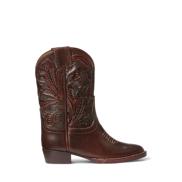 A faithful reproduction of our iconic Plainview cowboy boot scaled down to a collectible size. Inspired by samples used by traveling salesmen in the early 1900s. Leather and branding elements are from the Double RL footwear line. Vegetable-tanned cowhide shaft is hand-tooled. Vamp is made with durable yet flexible cowhide that is sourced from a Chicago-based tannery. Comes in a signature box. Rustic Hand-tooled Boots For Western-themed Events, Traditional Brown Boots For Western-themed Events, Vintage Hand Tooled Boots With Round Toe, Vintage Hand-tooled Boots With Round Toe, Vintage Leather Boots For Country Events, Traditional Leather Boots For Ranch, Vintage Hand-tooled Boots For Western-themed Events, Classic Vintage Brown Boots For Western-themed Events, Vintage Brown Vegetable-tanned Boots