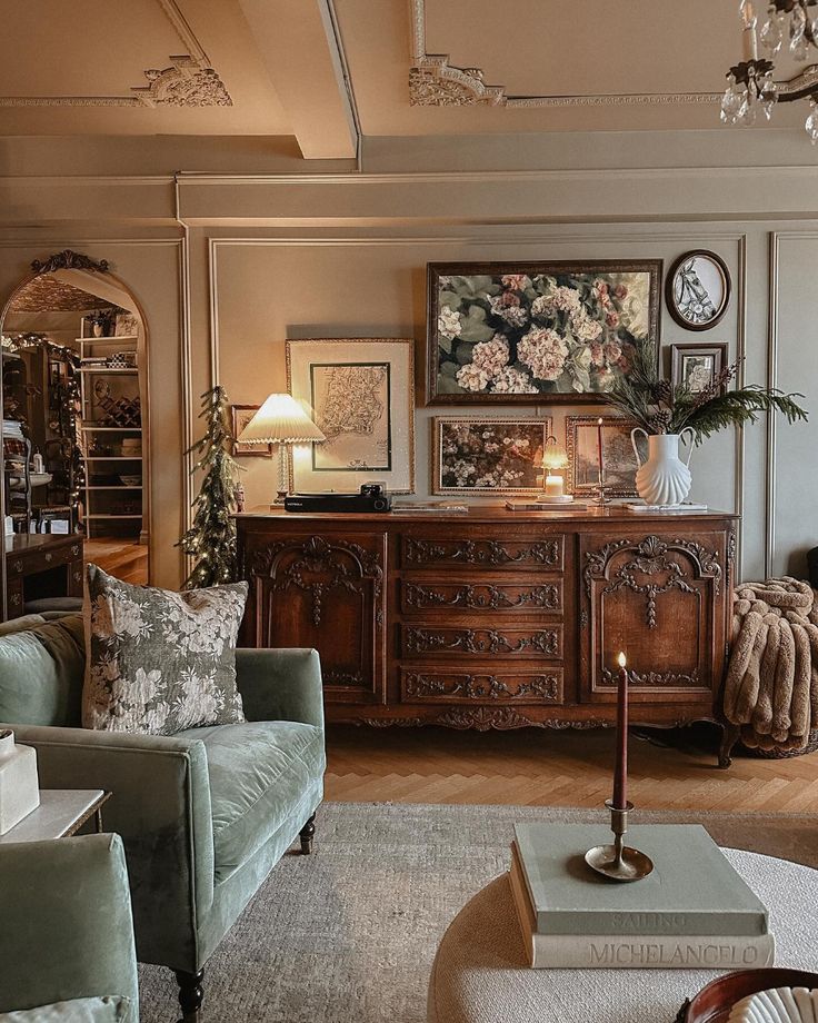 a living room filled with furniture and a chandelier