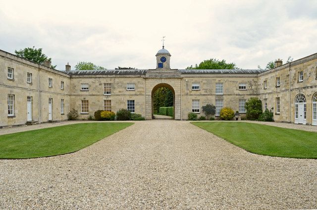 a large stone building with a clock tower