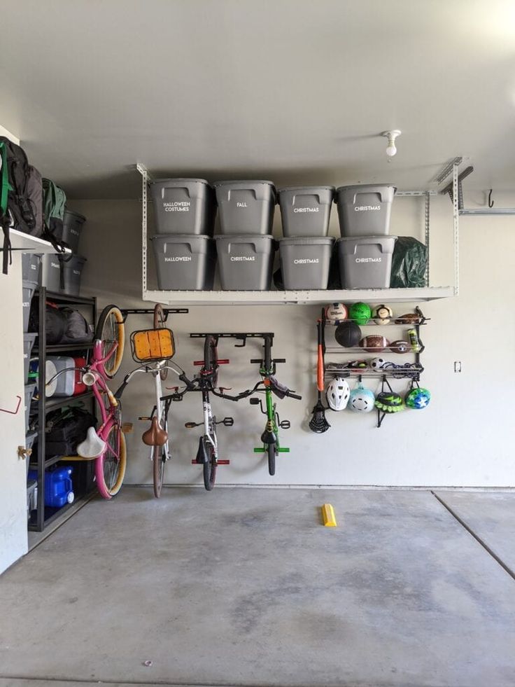 a garage filled with lots of storage bins